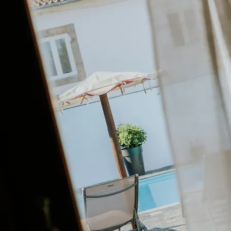 Casa Relogio De Sol * למאגו